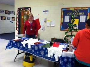 Pam Varghese volunteers at the Holiday Store.